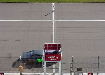 Zooming by the flagstand